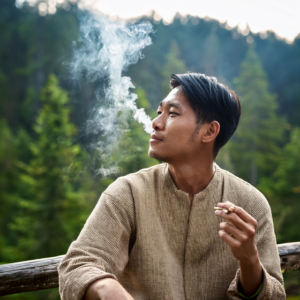 Relaxed cannabis user enjoying terpene-rich strain outdoors in San Diego